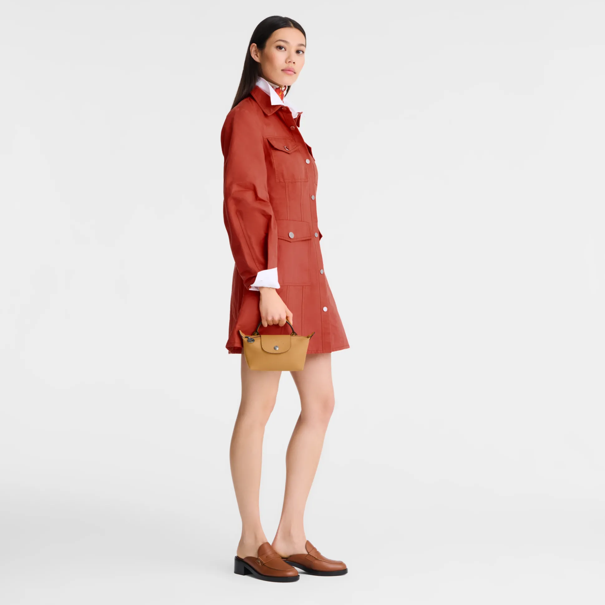 Shop Longchamp Pochette XS Miele